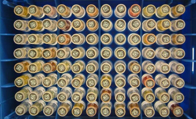 Small tubes with a QR-coded beneath them.