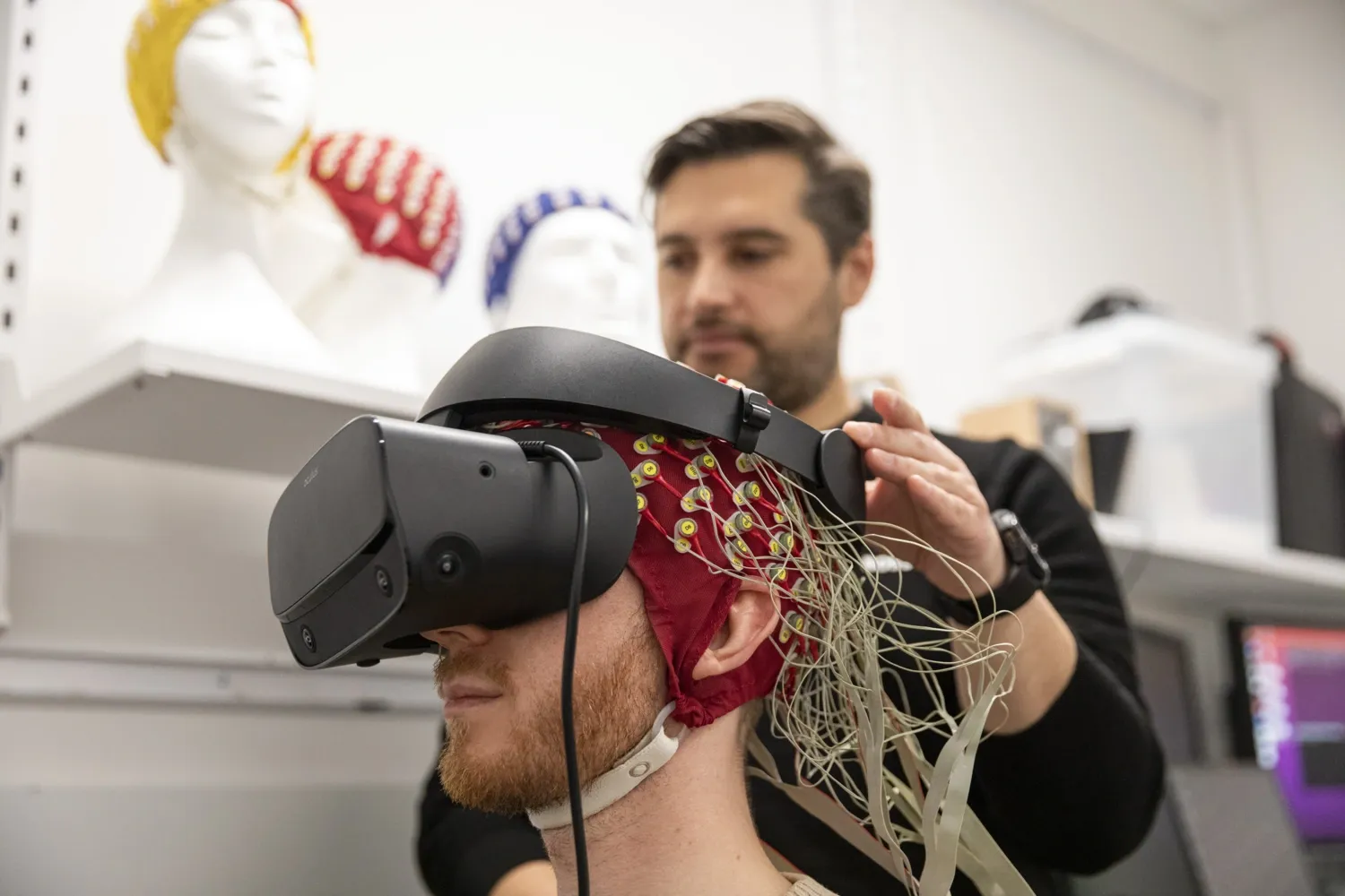 Two group members using VR techniques in an experiment.