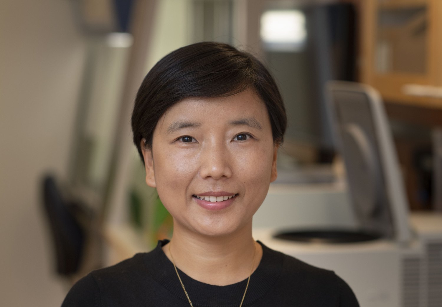 Portrait of professor Fang Fang in the lab.