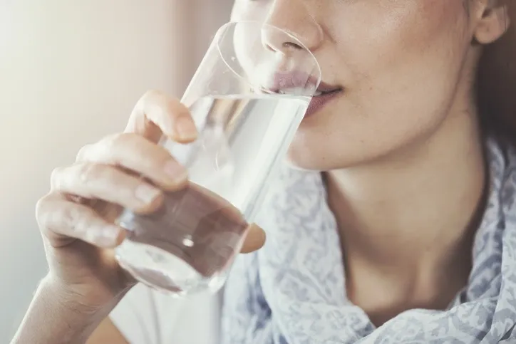 Woman drinking a glass of water