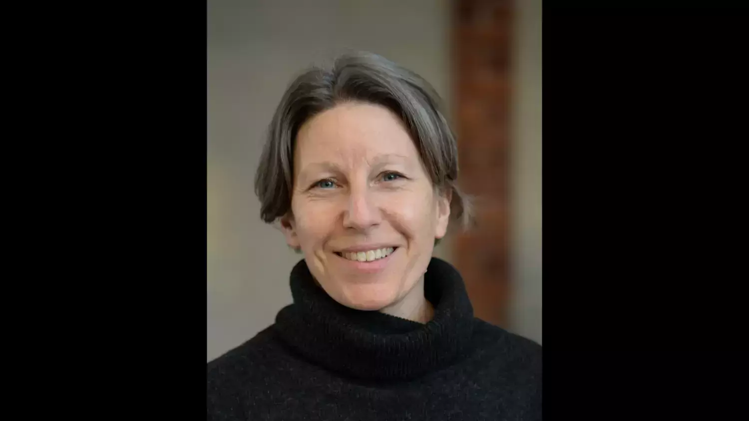 Profile photo of Helena Hervius Askling, a woman with short grey hair and a black jumper