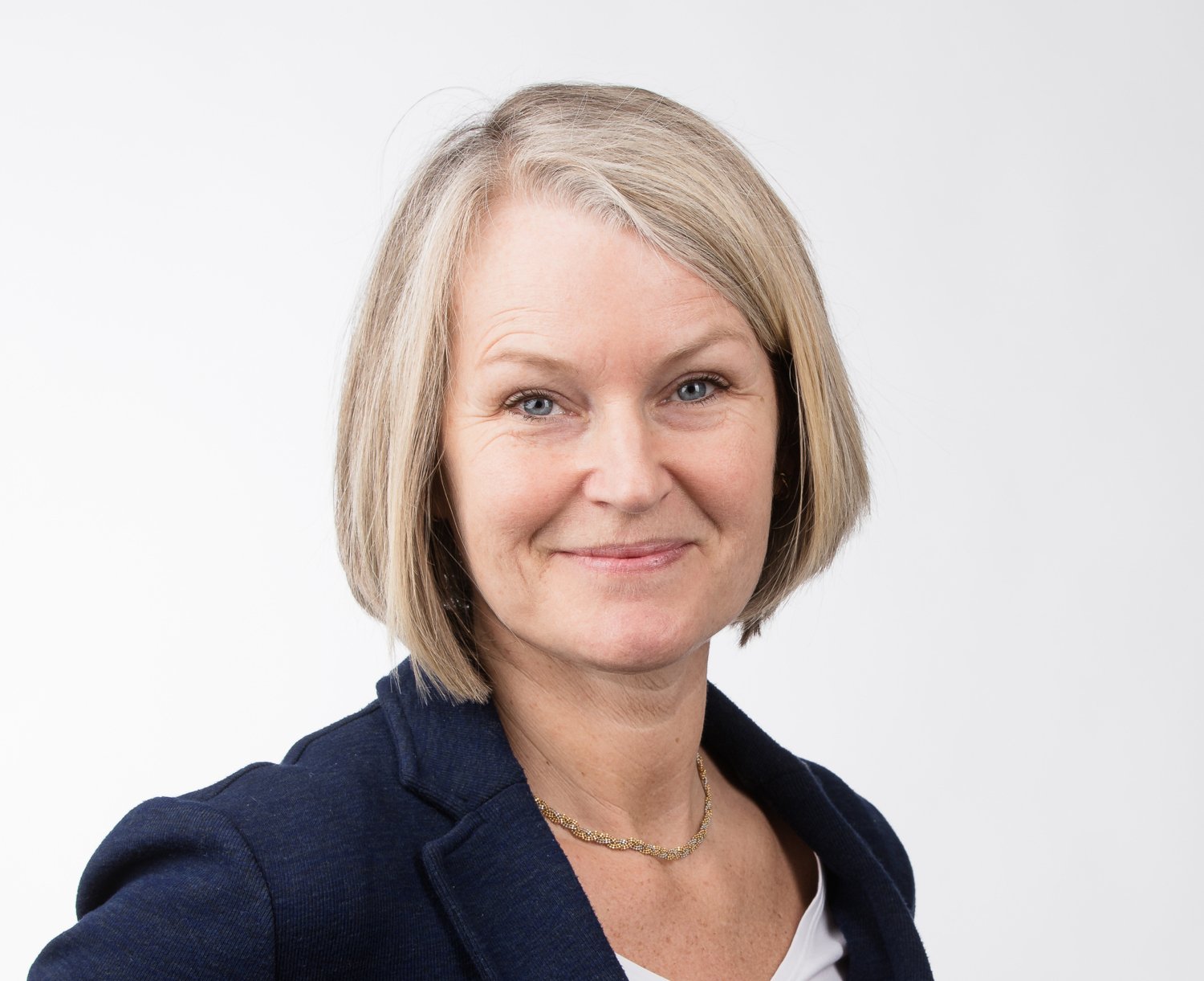 Bild på Iben Axén i kavaj.