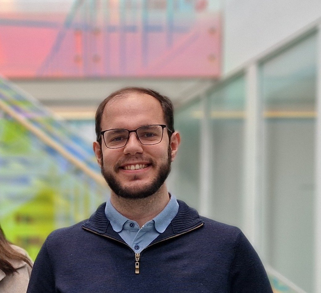 Gruppbild på tre personer.