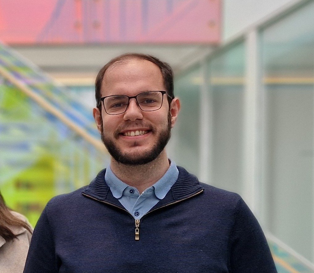 Group photo of three people.