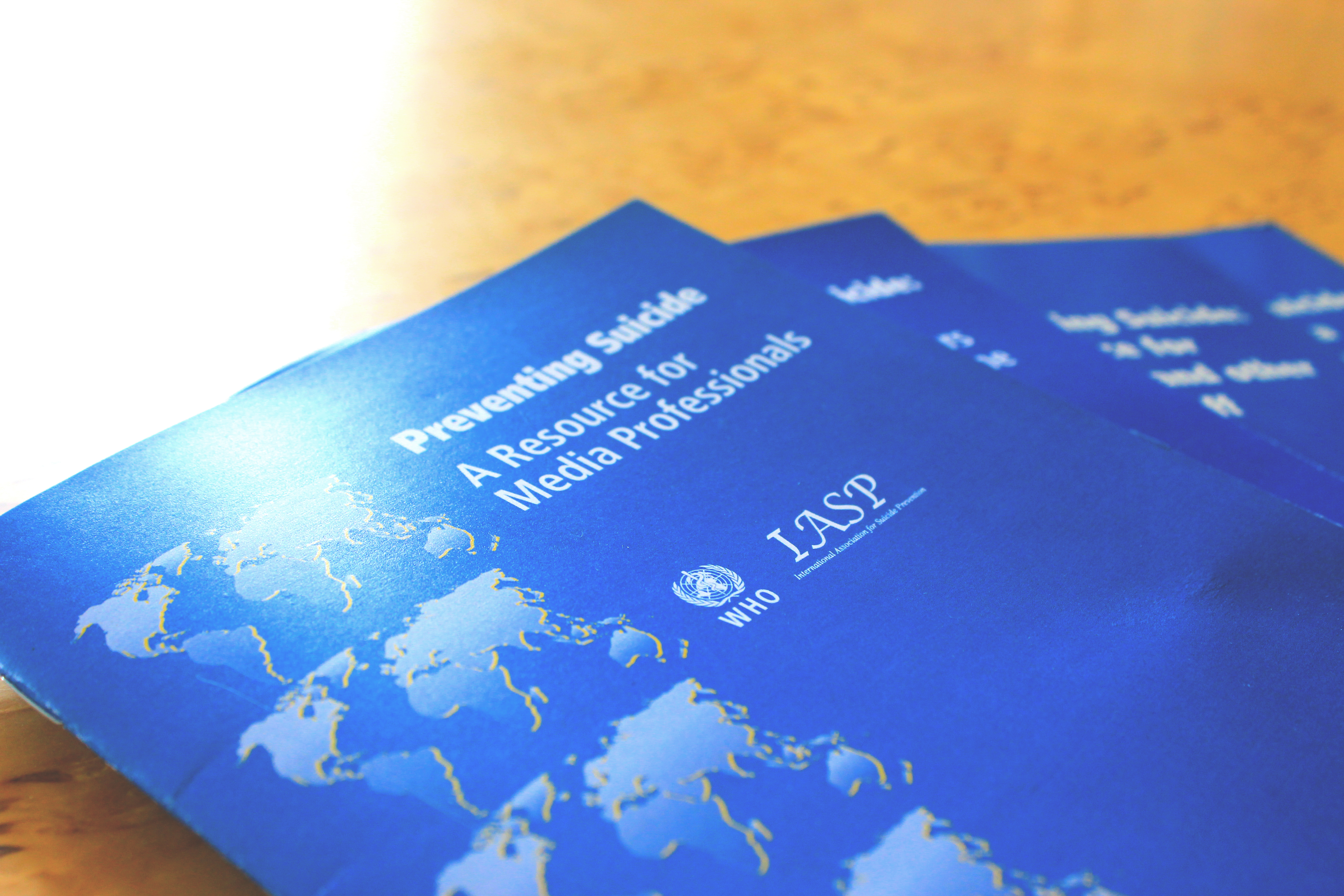 WHO resource material placed on a table