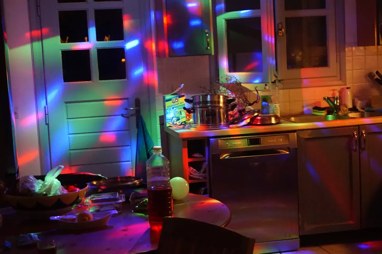 Room with multiple colours representing lasers used within the group, as a signature.