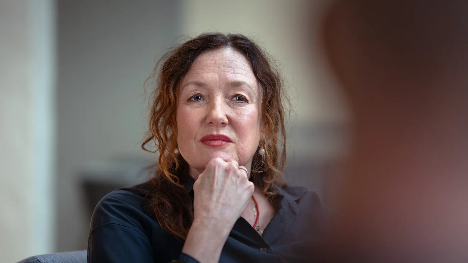 Porträtt av en kvinna.