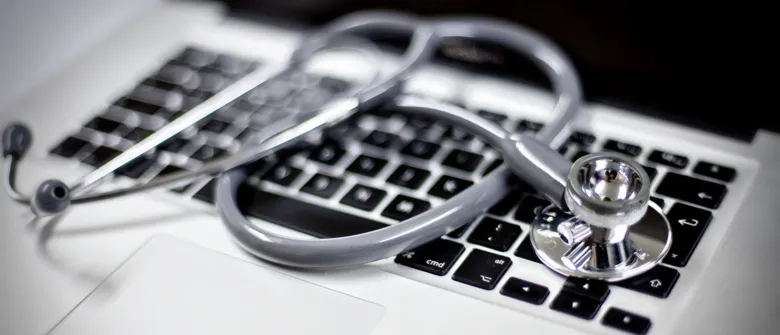 stethoscope on computer