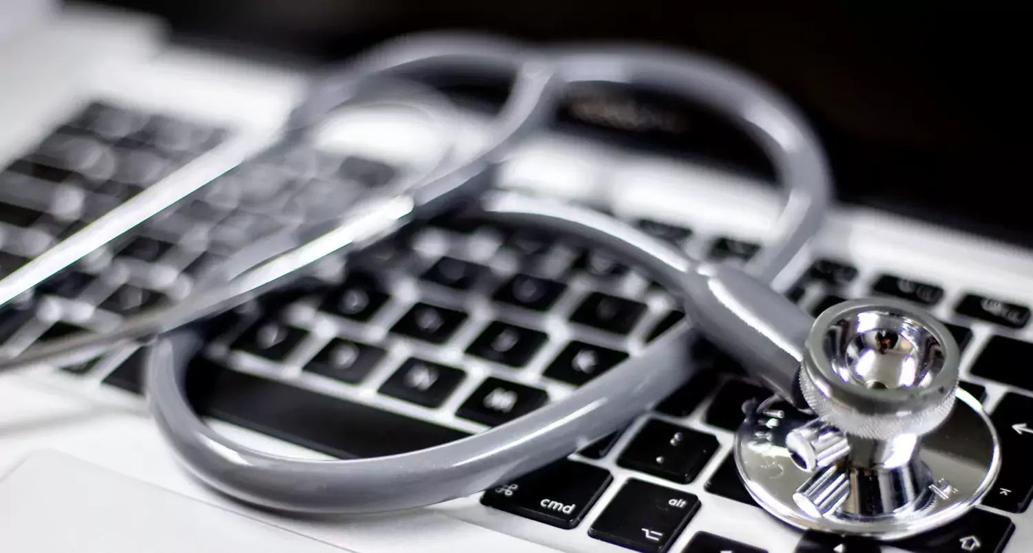 stethoscope on computer