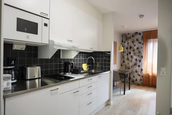 Kitchenette in a studio apartment, KI Residence Solna.