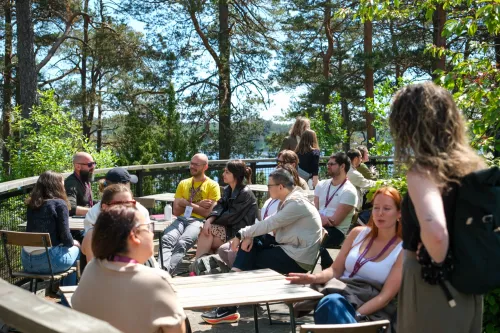 Groups of people talking outside